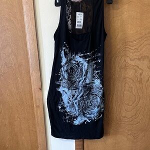 Black Sleeveless Top with Floral Design